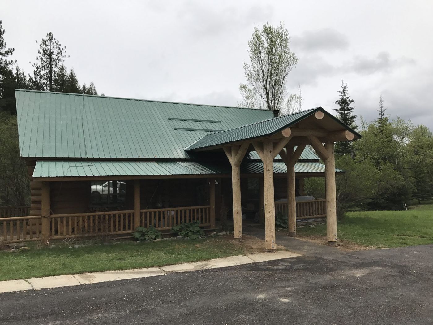 Finished lodge, green standing-seam roof