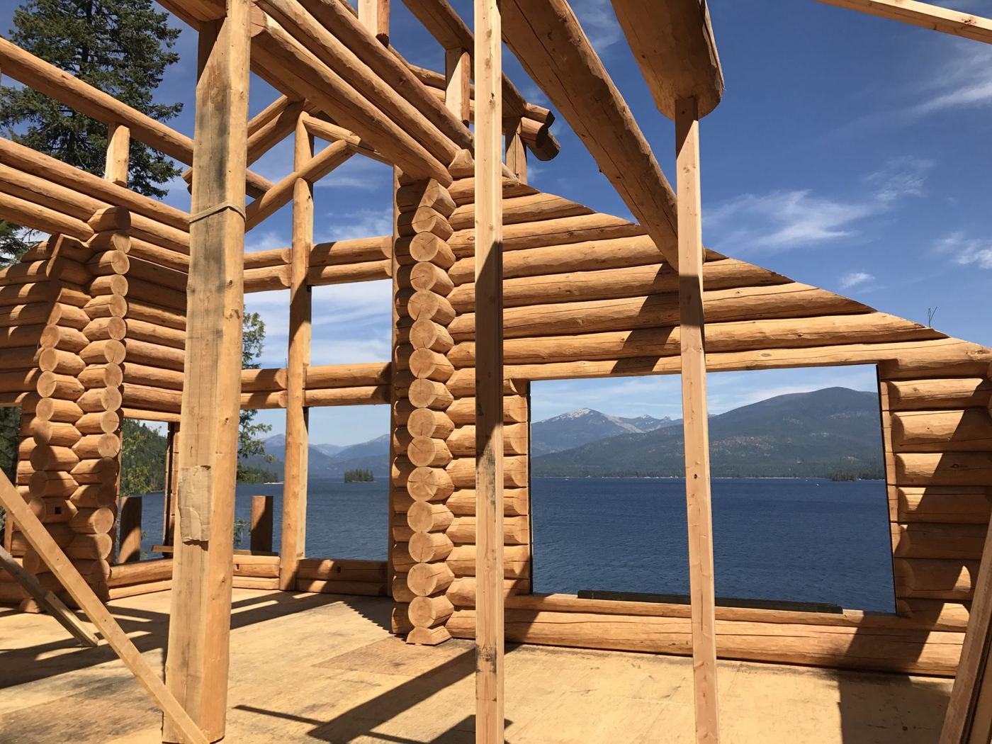 Log walls going up, lake side