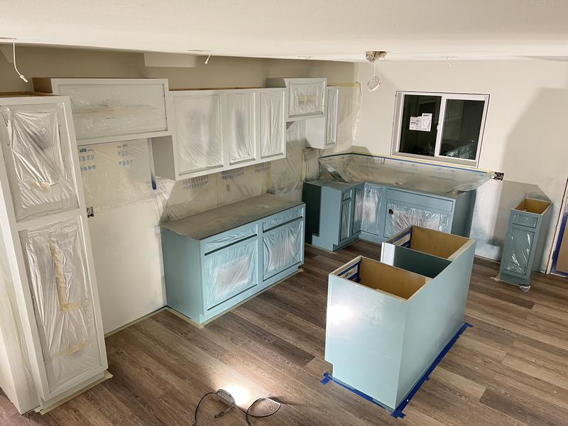 Painted cabinets going in
