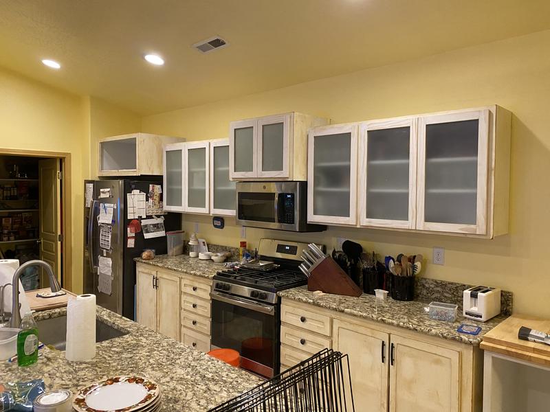 Kitchen with glass-front uppers