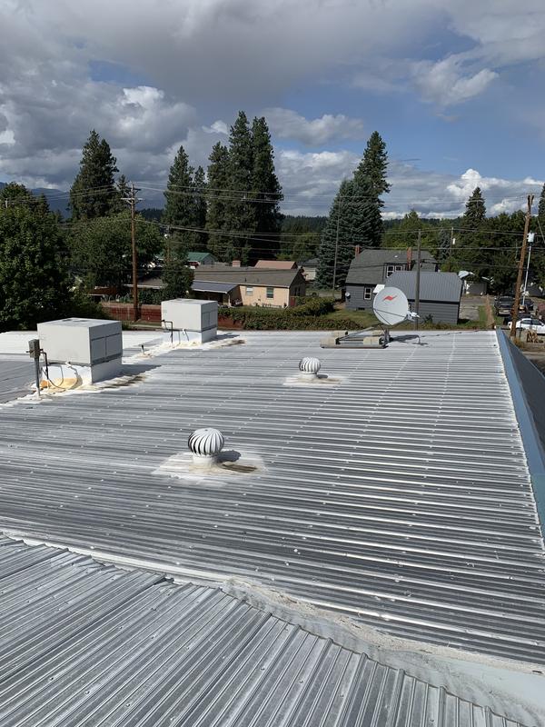 Metal roof panels going on