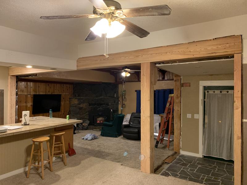 After: opened up with a wrapped beam and posts